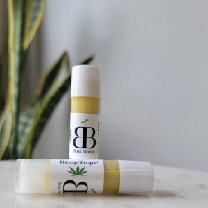 Two tubes of hemp tropic lip balm.