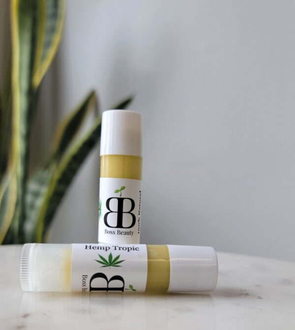 Two tubes of hemp tropic lip balm.