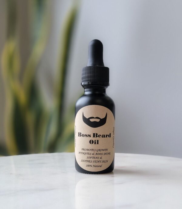 Black bottle of Boss Beard Oil.