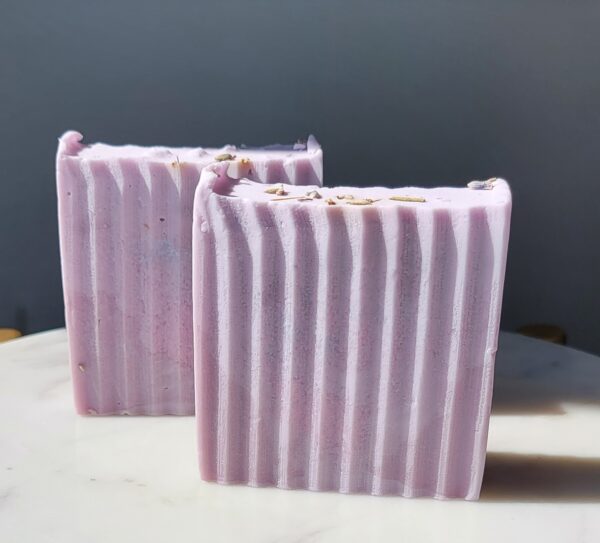 Two bars of purple lavender soap.