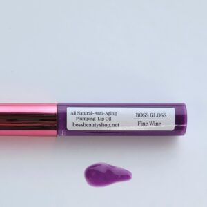 Purple lip gloss tube and swipe.