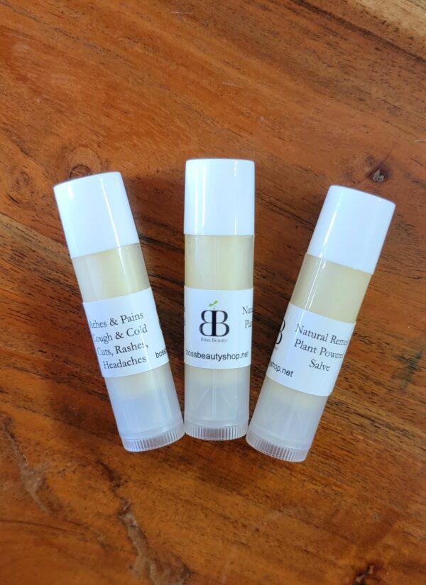 Three white tubes of natural salve.