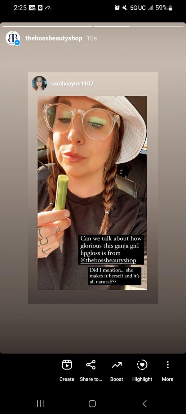 Woman with green lip gloss in car.