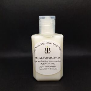 White bottle of hand & body lotion.