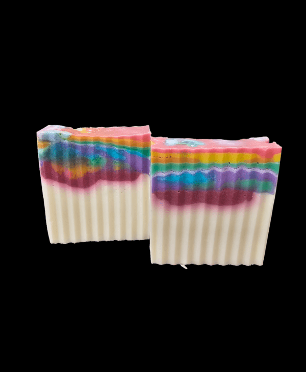 Two rainbow swirl bars of soap.