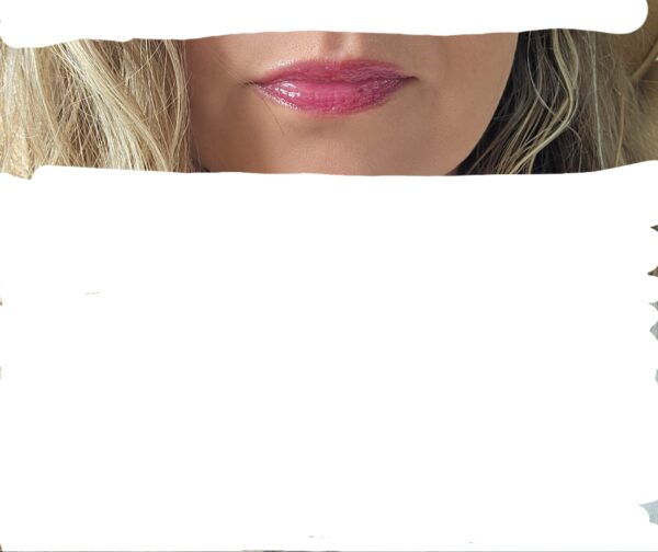 Close-up of woman's lips with pink gloss.