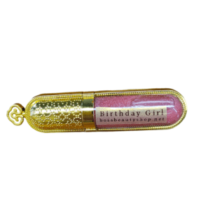 Gold lipstick tube with pink gloss.