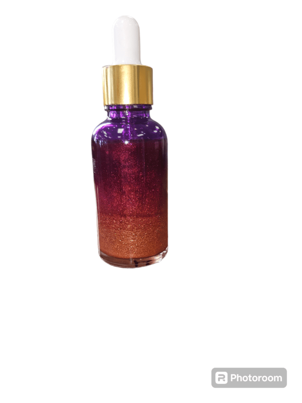 Purple and gold glitter serum bottle.