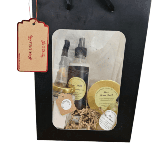 Hair care gift set in black bag.